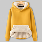 Yellow hoodie with cream sherpa fleece lining, featuring a drawstring hood and a large cozy front pocket.
