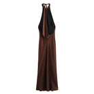 Back view of brown halter neck maxi dress.