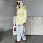 Oversized Donsjack voor Dames met Gewatteerde Isolatie en Verstelbare Capuchon – Duurzame Buitenlaag voor Koude Seizoenen 9